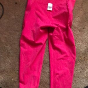 Pink leggings never worn. has pockets !!